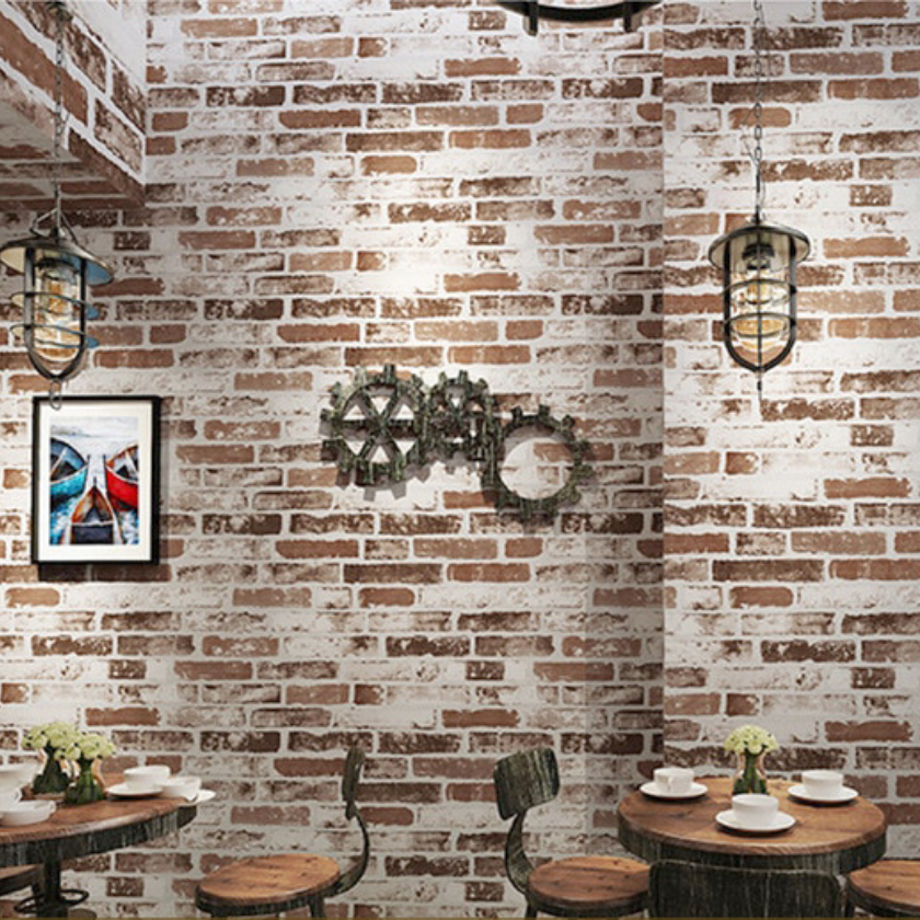 Home decoration on the brick wall using Brick Hangers on the dining area.